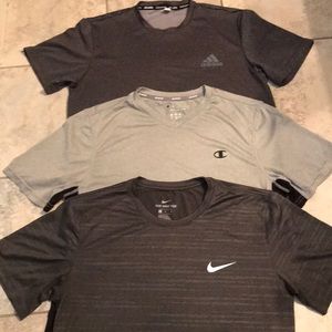 3 Men’s medium workout tees.